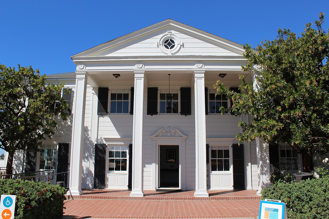 The white-columned historic guest house at Annenberg Community Beach House