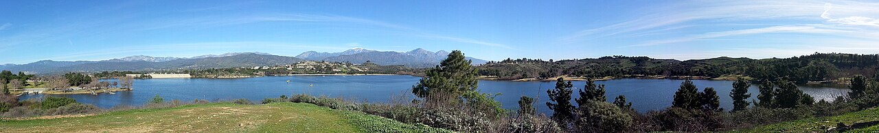 Wide view of Puddingstone Reservoir and the hills around it, not a trail-surface photograph